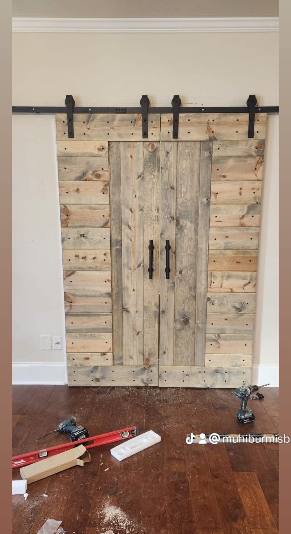 Custom double sliding barn door installation