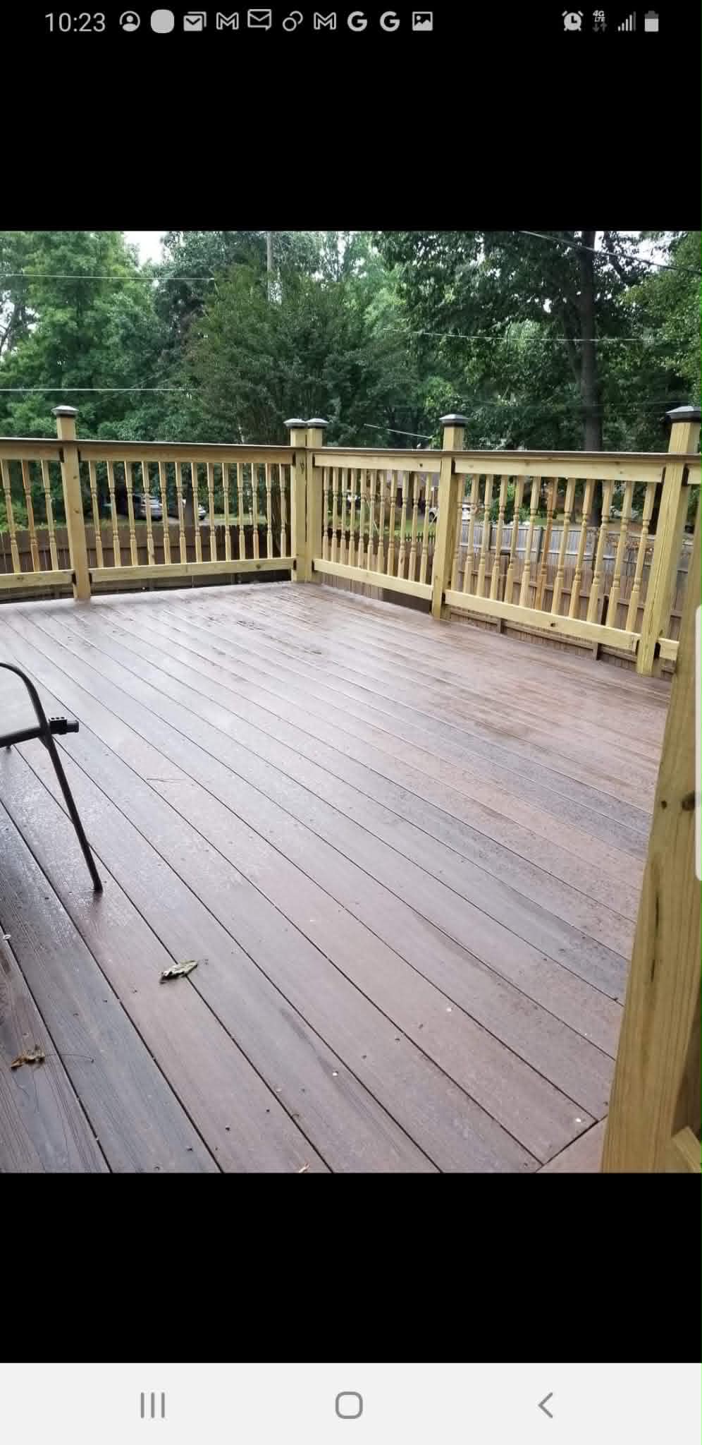 Finished wood deck with railing